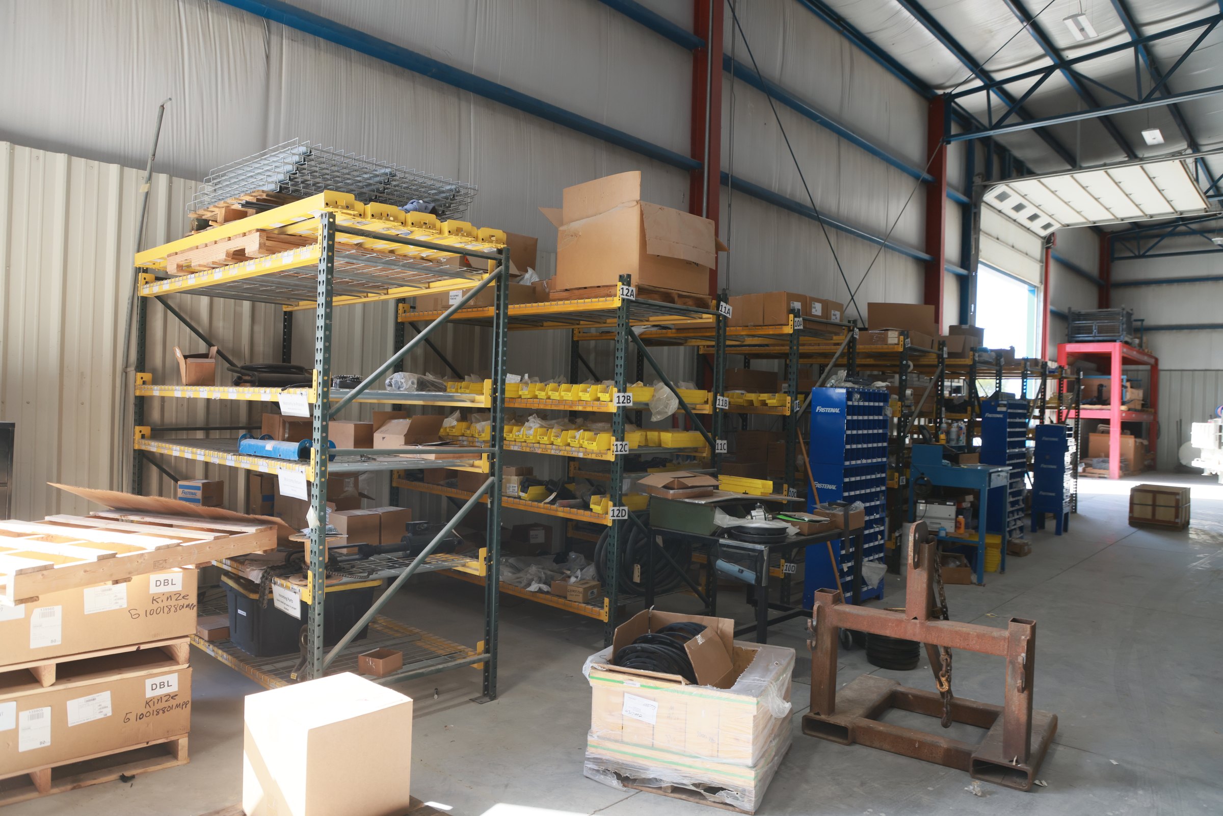 Shelves of Kinze parts in the Blue Equipment parts warehouse