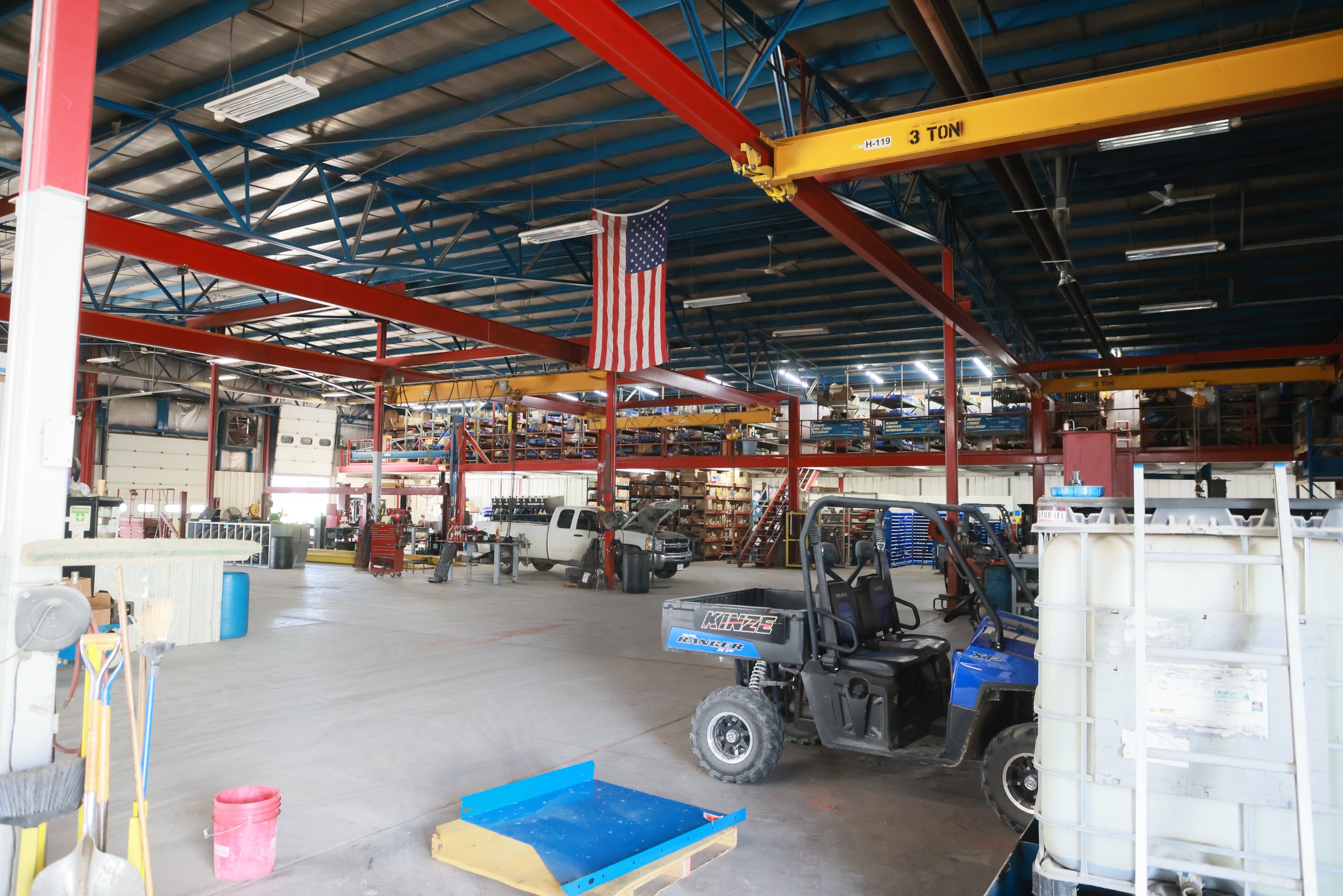 Inside the Blue Equipment shop: service bays, overhead cranes and the parts mezzanine